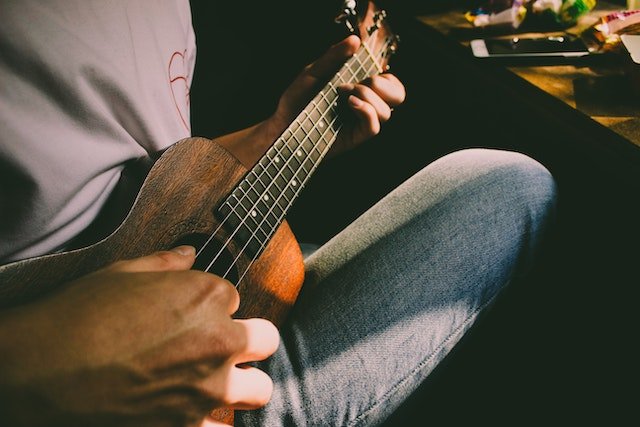 man playing guitar